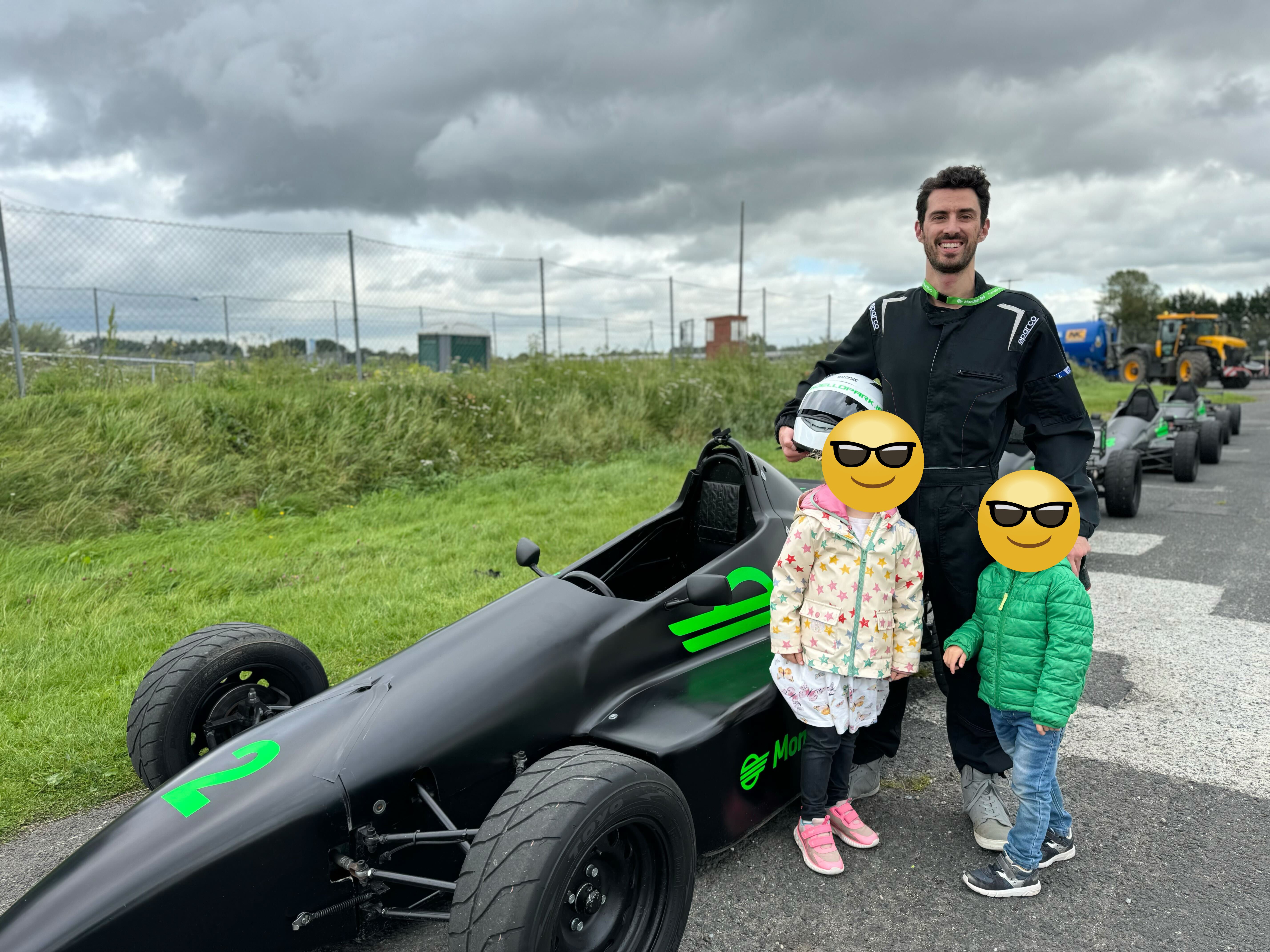 Kyle Libra standing with a Formula Sheane spec race car