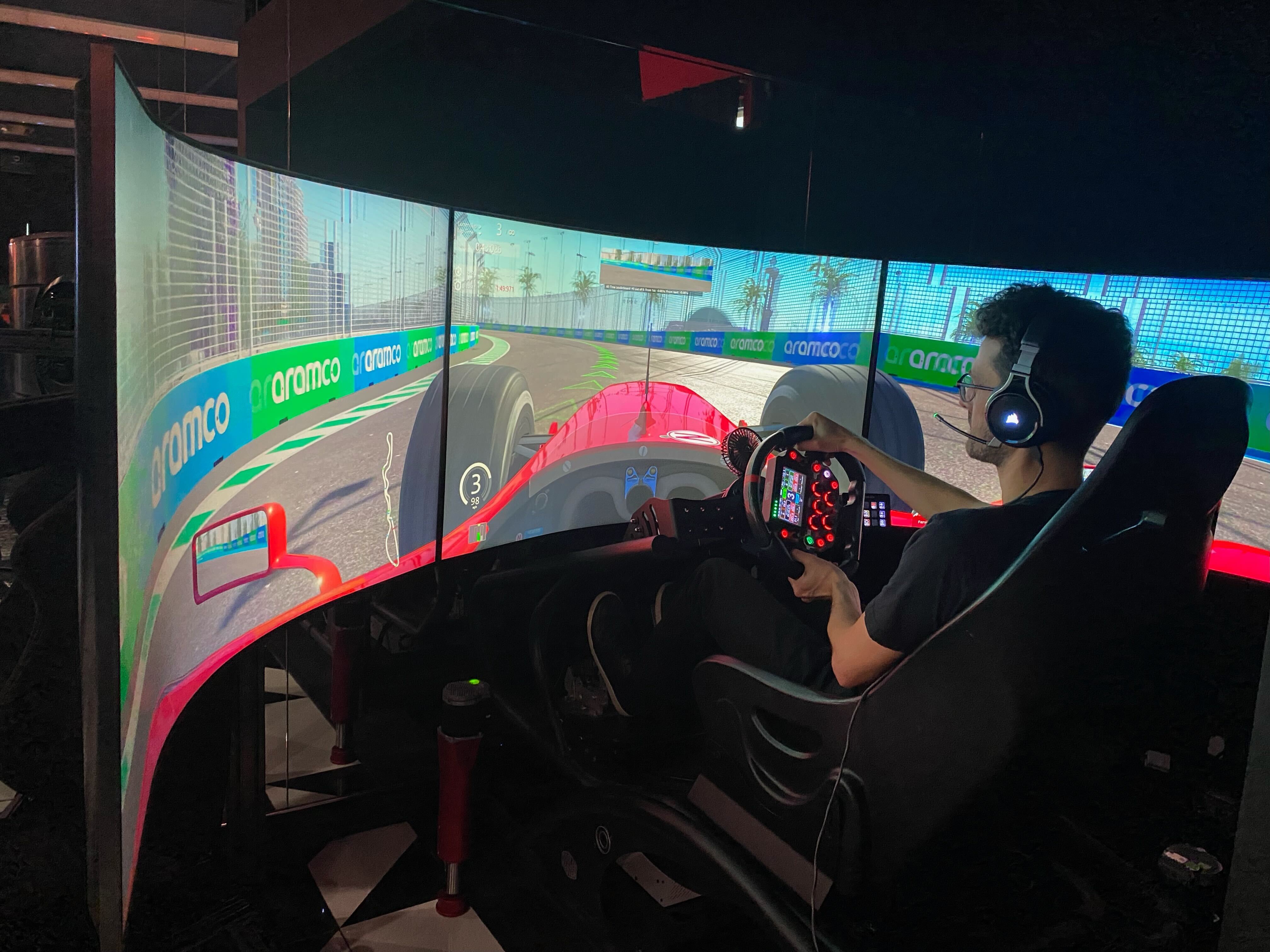 Kyle Libra in a sim racing cockpit, view from behind the wheel